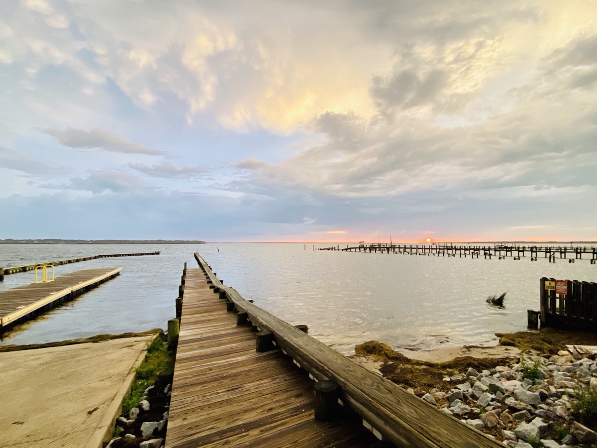 Avalon Beach Boating Access dock, with a sound-side view of sunset