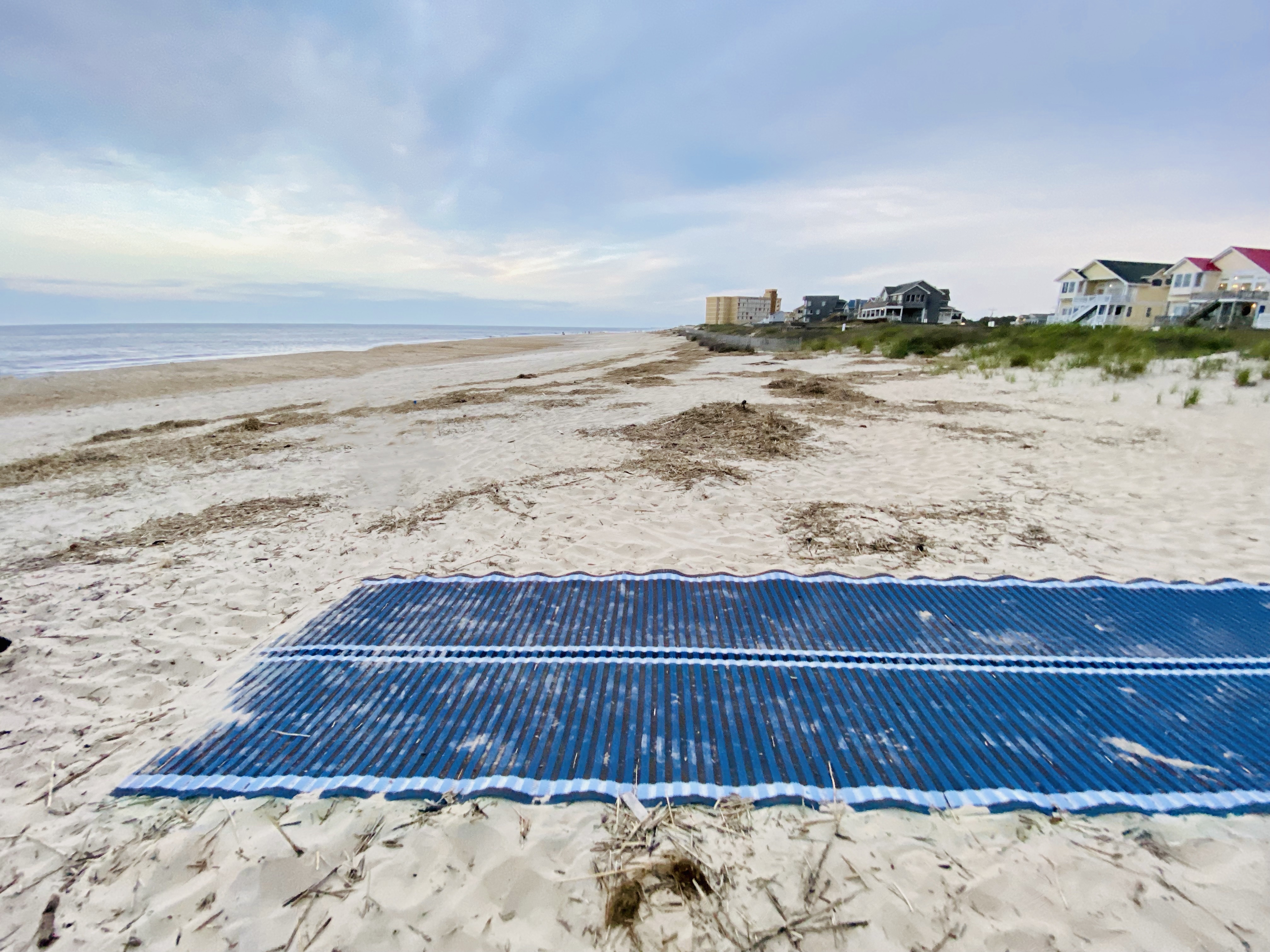 end of the beach mat on the beach at Jennet’s Pier 