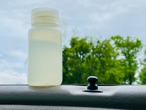 2oz Nalgene Water Container with the park as a background 
