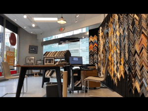 Wall of decorative frames as art in the framing section of Blick Art Materials in DC 