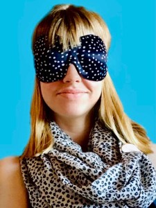 Me wearing 40 Blinks Sleep-mask which helps block out light with a migraine